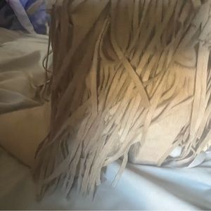 Fringe boots in ivory